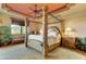 Spacious main bedroom with a large four poster bed at 18626 E Amarado Cir, Rio Verde, AZ 85263