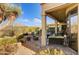 Relaxing patio with seating area and mountain views at 18626 E Amarado Cir, Rio Verde, AZ 85263