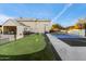 Large backyard featuring a sports court and putting green at 30017 N 60Th St, Cave Creek, AZ 85331