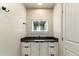 Modern bathroom with a floating vanity and updated fixtures at 30017 N 60Th St, Cave Creek, AZ 85331