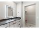 Bathroom with single sink, modern vanity, and access to closet at 30017 N 60Th St, Cave Creek, AZ 85331