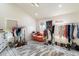 Large bedroom closet with clothing racks and plenty of storage at 30017 N 60Th St, Cave Creek, AZ 85331
