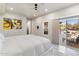 Main bedroom with sliding door access to the backyard patio and pool at 30017 N 60Th St, Cave Creek, AZ 85331