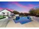 Stunning pool and spa area with fire pit and seating at 30017 N 60Th St, Cave Creek, AZ 85331