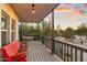Covered porch with red bench and table at 30017 N 60Th St, Cave Creek, AZ 85331