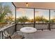 Covered porch with table and chairs at 30017 N 60Th St, Cave Creek, AZ 85331