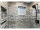 Clean shower with gray tile and built-in shelves at 30017 N 60Th St, Cave Creek, AZ 85331