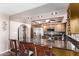 Updated kitchen featuring granite counters and wood cabinets at 4520 W Corrine Dr, Glendale, AZ 85304