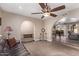 Open living room with a view into another living area at 4520 W Corrine Dr, Glendale, AZ 85304