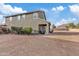 Large backyard with grassy area and fire pit at 4642 W Alabama Ln, San Tan Valley, AZ 85144