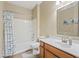 Clean bathroom with a bathtub, toilet, and wood vanity at 4642 W Alabama Ln, San Tan Valley, AZ 85144