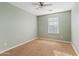 Simple bedroom with neutral walls and ceiling fan at 4642 W Alabama Ln, San Tan Valley, AZ 85144