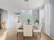 Dining room with a six-seat table, staircase, and light walls at 4642 W Alabama Ln, San Tan Valley, AZ 85144