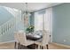 Formal dining room featuring a six-chair table and neutral decor at 4642 W Alabama Ln, San Tan Valley, AZ 85144