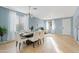 Dining area with a table for six, light walls, and a view of the entryway at 4642 W Alabama Ln, San Tan Valley, AZ 85144