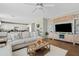 Open living room with a view into the kitchen and comfortable seating at 4642 W Alabama Ln, San Tan Valley, AZ 85144