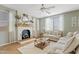 Relaxing living room featuring a fireplace and neutral color palette at 4642 W Alabama Ln, San Tan Valley, AZ 85144