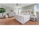 Spacious main bedroom with a king-size bed and ample storage at 4642 W Alabama Ln, San Tan Valley, AZ 85144