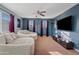 Relaxing media room featuring plush seating and a large TV at 4642 W Alabama Ln, San Tan Valley, AZ 85144