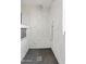 Elegant shower with marble tile and built-in bench at 4642 W Alabama Ln, San Tan Valley, AZ 85144