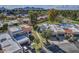 Aerial view of a community with Spanish style homes and lush landscaping at 7663 E Pleasant Run, Scottsdale, AZ 85258