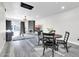 Dining area with four chairs and view to the living room at 7663 E Pleasant Run, Scottsdale, AZ 85258