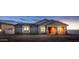 Gray house exterior with a covered entryway and stone accents at 1 N Brenner Pass Rd, Queen Creek, AZ 85144