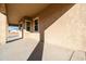 Covered patio with concrete flooring and access to the backyard at 1 N Brenner Pass Rd, Queen Creek, AZ 85144