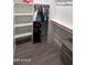 Well-organized closet featuring shelves and hanging space at 12121 S 214Th Ave, Buckeye, AZ 85326