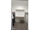 Spacious walk-in closet with ample shelving and hanging rods at 12121 S 214Th Ave, Buckeye, AZ 85326