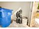 Garage with water softener and storage space at 13348 W Calavar Cir, Surprise, AZ 85379