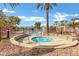 Community hot tub surrounded by stone and landscaping at 13610 S 41St Pl, Phoenix, AZ 85044