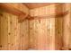 Shelved closet with wood walls and flooring at 16409 E Kingstree Blvd, Fountain Hills, AZ 85268