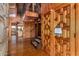 Wood-paneled entryway with staircase and wood floors at 16409 E Kingstree Blvd, Fountain Hills, AZ 85268