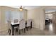 Dining area with table, chairs, and ceiling fan at 16626 S 45Th St, Phoenix, AZ 85048