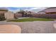 Landscaped backyard with pergola and storage shed at 1923 E Zion Way, Chandler, AZ 85249