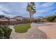Landscaped backyard oasis with a pool and artificial turf at 1923 E Zion Way, Chandler, AZ 85249