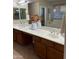 Spacious bathroom with double sinks, ample counter space, and a large mirror, ideal for comfortable living at 1923 E Zion Way, Chandler, AZ 85249