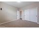 Well-lit bedroom featuring double door closet at 1923 E Zion Way, Chandler, AZ 85249