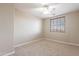Well-lit bedroom featuring carpet and window blinds at 1923 E Zion Way, Chandler, AZ 85249