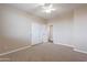 Spacious bedroom with carpet, ceiling fan and double doors to closet at 1923 E Zion Way, Chandler, AZ 85249