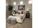 Inviting bedroom with a serene atmosphere, showcasing a beautifully styled bed and complementary decor at 1923 E Zion Way, Chandler, AZ 85249