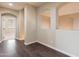 Bright hallway with wood flooring and arched niches at 1923 E Zion Way, Chandler, AZ 85249
