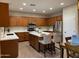 Bright kitchen featuring stainless steel appliances, a center island, and ample storage at 1923 E Zion Way, Chandler, AZ 85249
