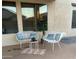 Cozy outdoor patio with comfortable seating and decorative plants, perfect for relaxation and entertaining at 1923 E Zion Way, Chandler, AZ 85249