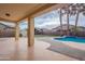 Inviting backyard pool with surrounding patio at 1923 E Zion Way, Chandler, AZ 85249