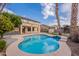 Inviting kidney shaped pool with surrounding patio at 1923 E Zion Way, Chandler, AZ 85249