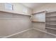 Large walk-in closet with shelving and hanging rods at 1923 E Zion Way, Chandler, AZ 85249