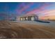 View of the home's back exterior showcasing covered patio at 26611 S 187Th Ave, Buckeye, AZ 85326