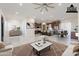 Open concept living area with modern kitchen and dining space at 26611 S 187Th Ave, Buckeye, AZ 85326